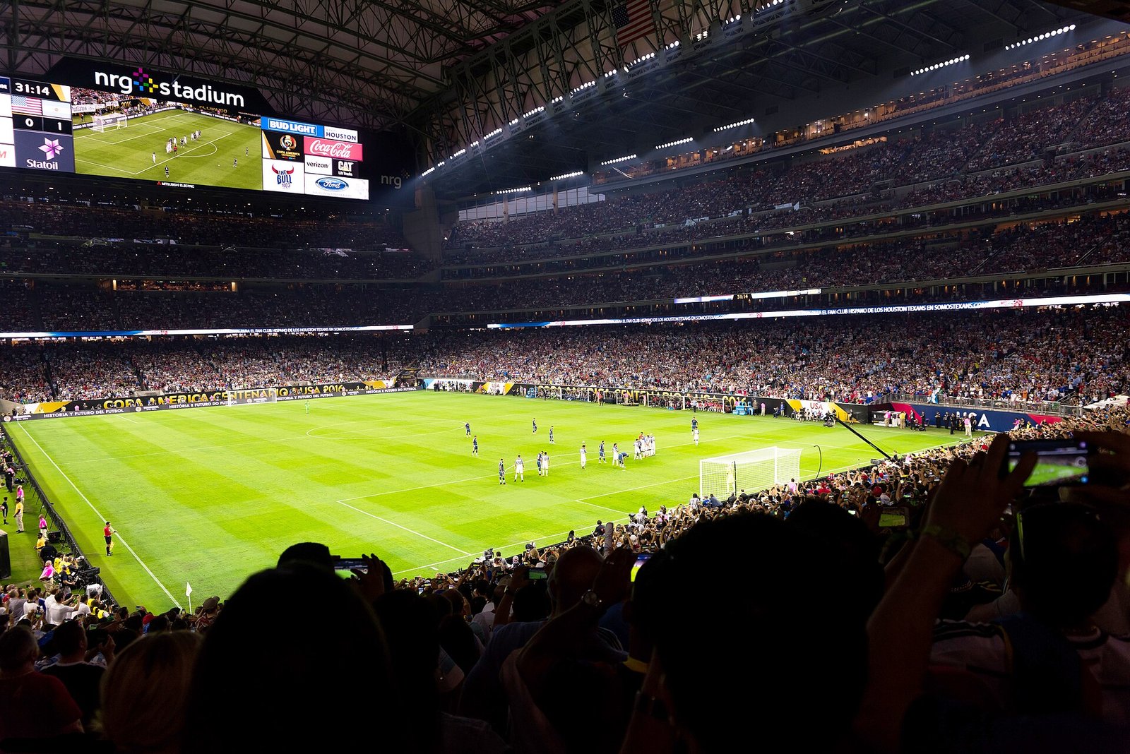 Fans film Messi lining up a free kick at NRG Stadium in Houston