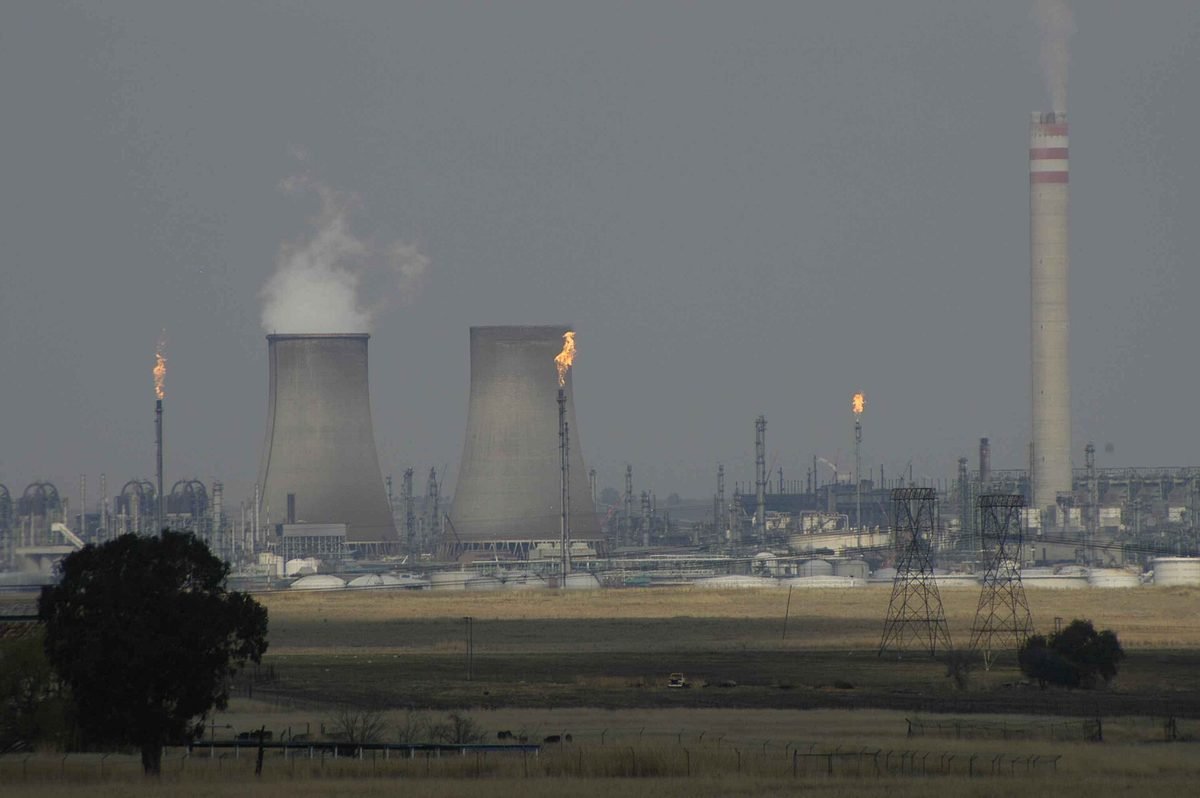 The Sasol synthetic fuel plant at Secunda, Mpumalanga, with cooling towers and gas flares